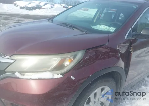 2015 Honda Cr-V Lx z USA, uszkodzony, nr VIN 2HKRM4H35FH604429
